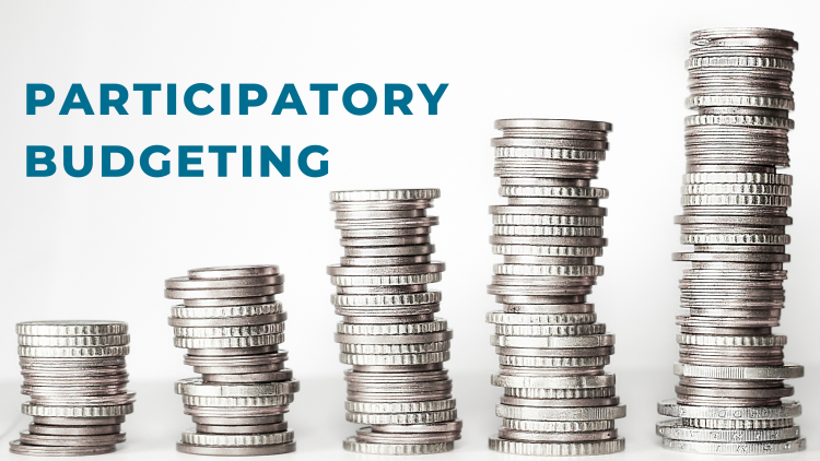 stack of coins with text saying "Participatory Budgeting"