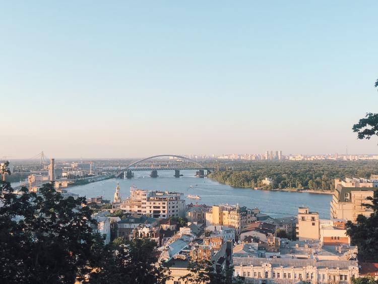 Aerial view of Kyiv, with rived and bridges in the center