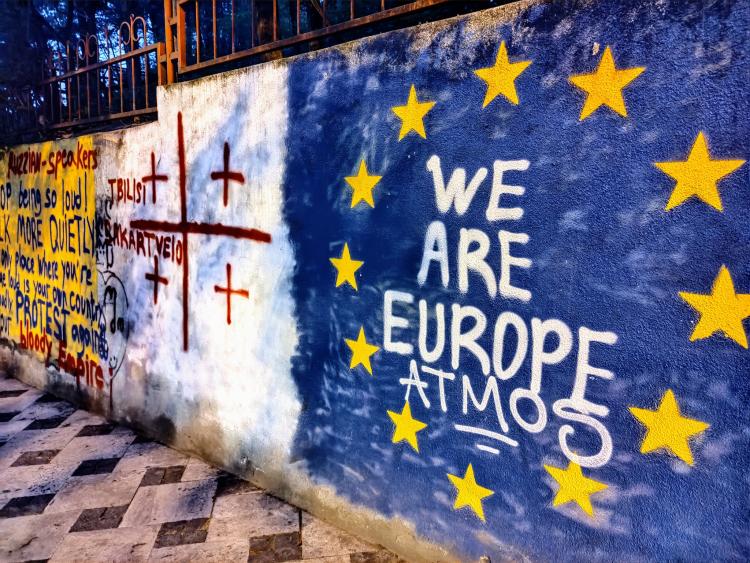 Graffiti of the Georgian and EU flag with the title 'We are Europe'