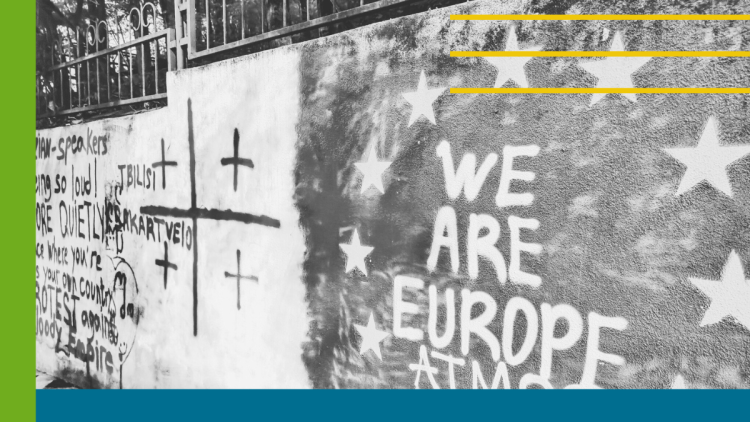 Graffiti of the Georgian and EU flag with the title 'We are Europe', and geometric elements